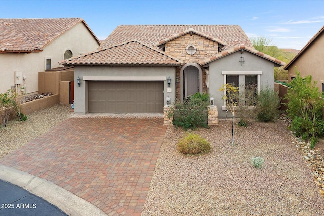 view of front of property with a garage