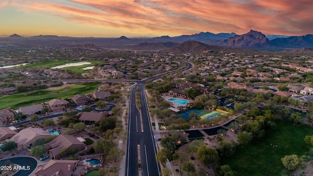 aerial view at dusk with a mountain view