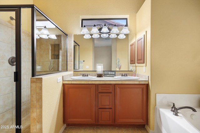 bathroom with vanity and independent shower and bath