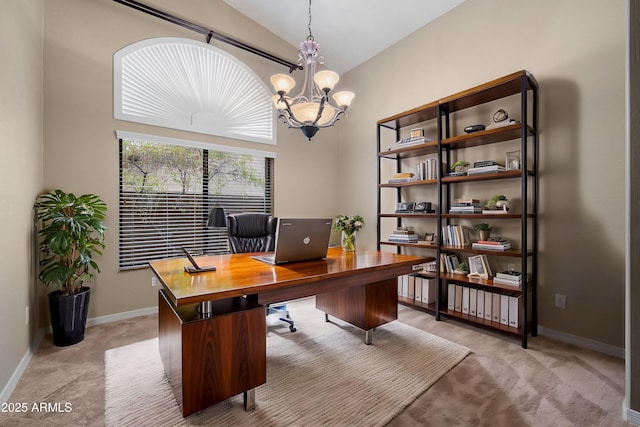 office featuring an inviting chandelier, vaulted ceiling, and light carpet