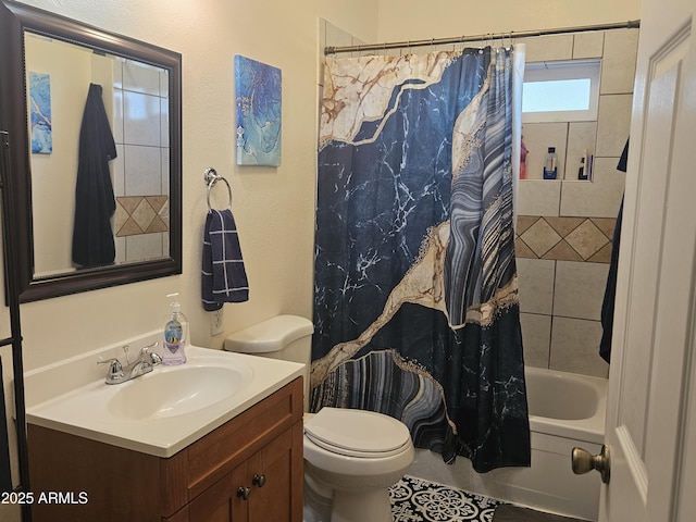 full bathroom featuring toilet, vanity, and shower / bathtub combination with curtain