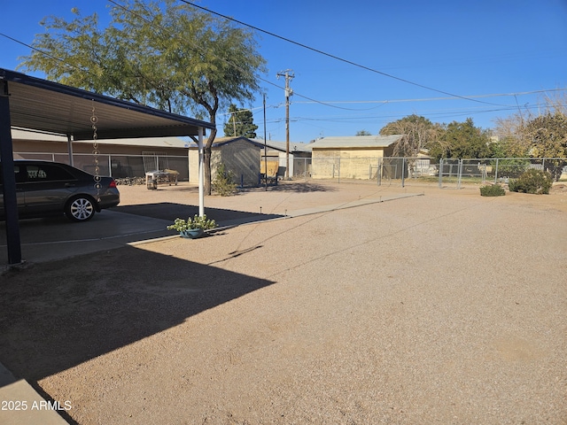 view of parking / parking lot with a carport