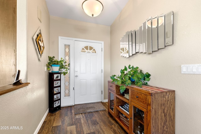 11180 E Navajo Dr, Dewey, AZ 86327 - foyer entrance with baseboards and dark wood-style floors