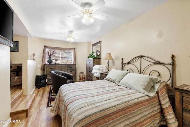 11180 E Navajo Dr, Dewey, AZ 86327 - bedroom featuring a ceiling fan and wood finished floors