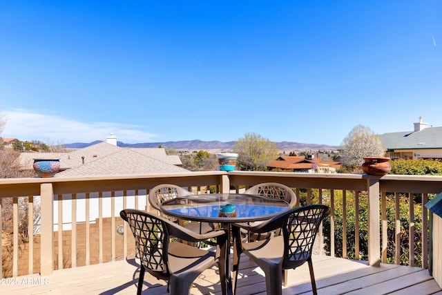 11180 E Navajo Dr, Dewey, AZ 86327 - wooden terrace with a mountain view and outdoor dining area