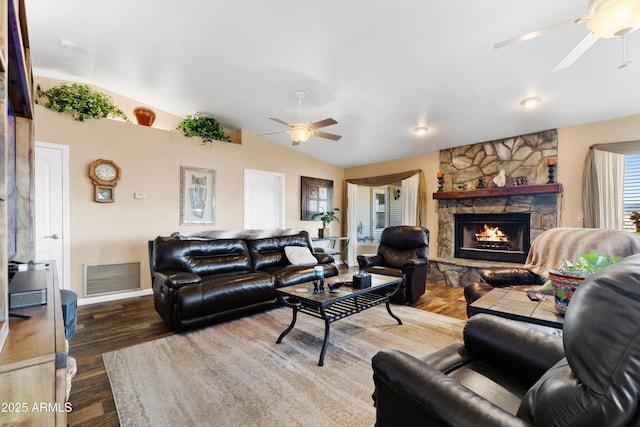 11180 E Navajo Dr, Dewey, AZ 86327 - living area featuring a fireplace, a ceiling fan, vaulted ceiling, visible vents, and dark wood-style floors