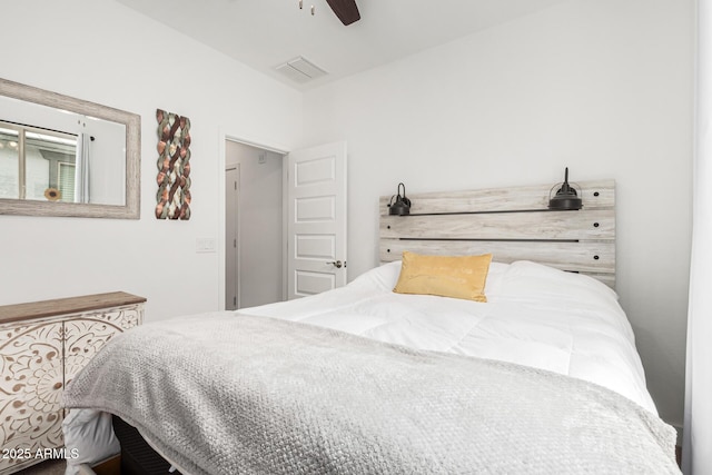 bedroom with visible vents and ceiling fan