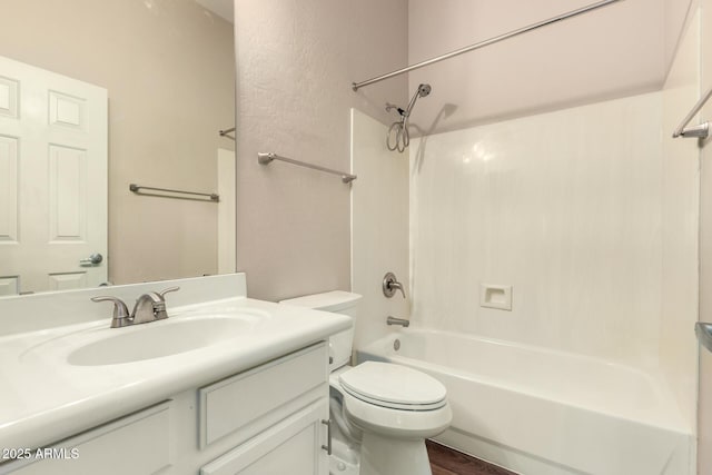 6970 W Paso Trl, Peoria, AZ 85383 - bathroom featuring toilet, wood finished floors, bathing tub / shower combination, and vanity