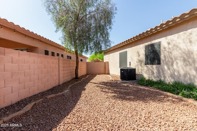 6970 W Paso Trl, Peoria, AZ 85383 - view of yard with central AC and a fenced backyard