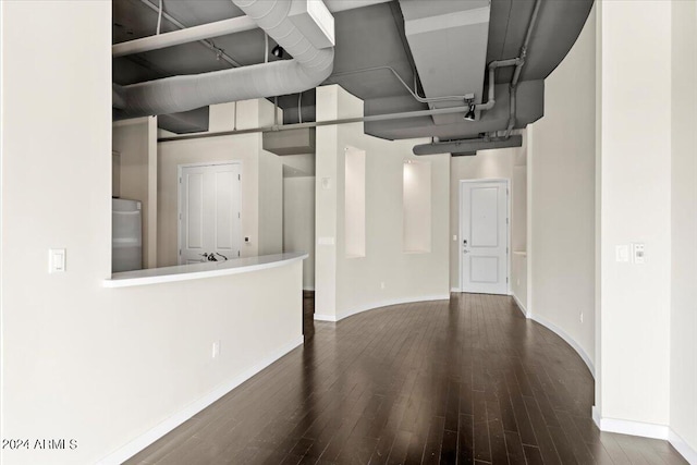 interior space with dark hardwood / wood-style floors