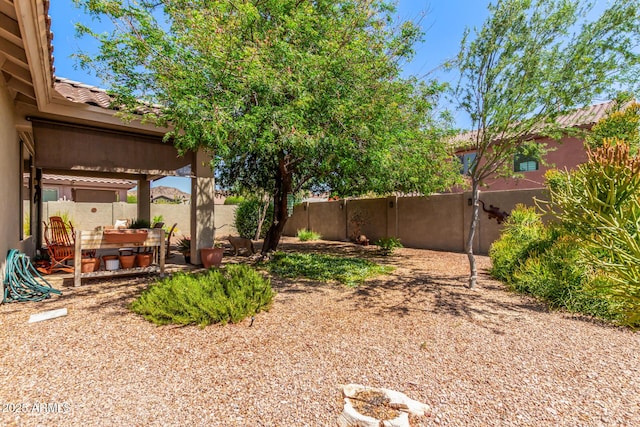 7617 E Desert Honeysuckle Dr, Gold Canyon, AZ 85118 - fenced backyard with a patio