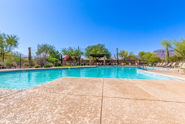 7617 E Desert Honeysuckle Dr, Gold Canyon, AZ 85118 - community pool with a patio