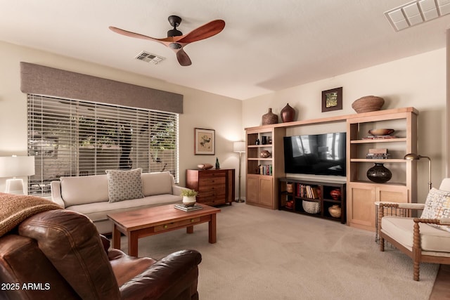 7617 E Desert Honeysuckle Dr, Gold Canyon, AZ 85118 - living area featuring a ceiling fan and light colored carpet