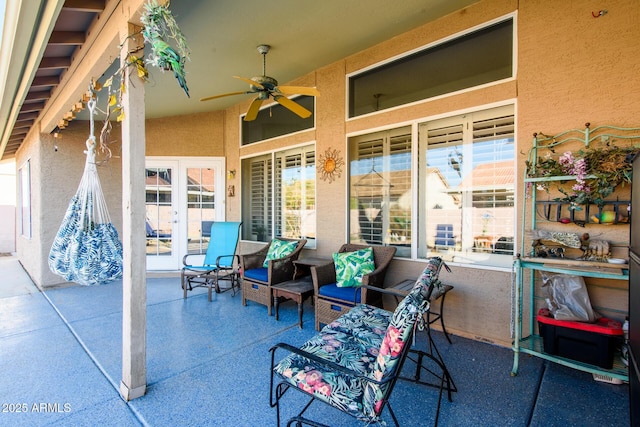 view of patio featuring ceiling fan