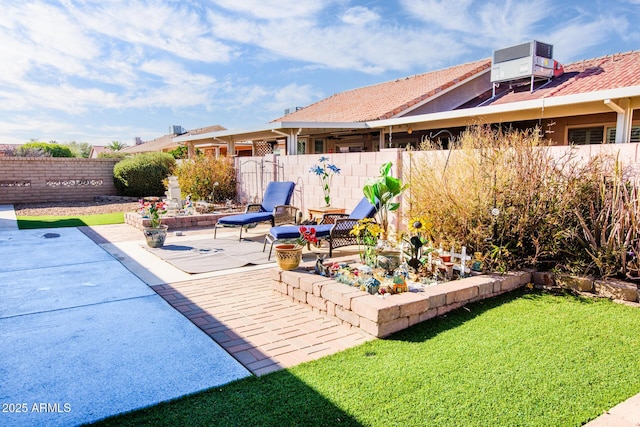 view of patio featuring cooling unit and fence