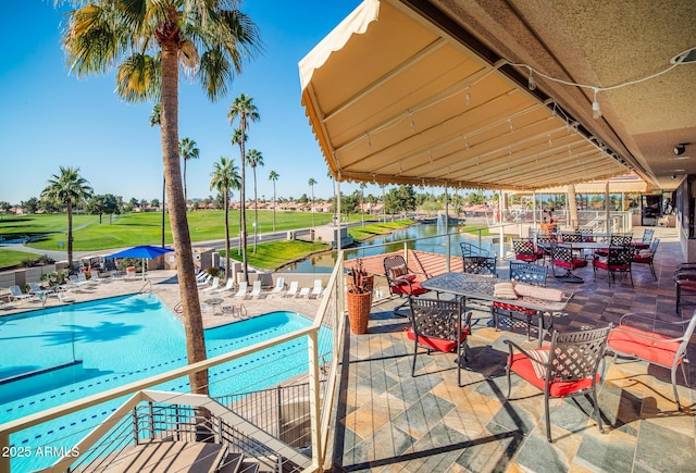 view of patio / terrace featuring a water view