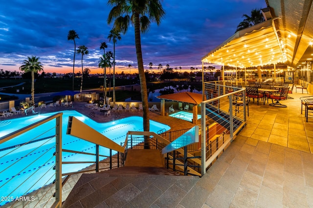 community pool with a patio