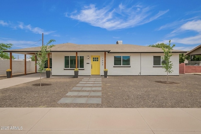 1909 N 74th St, Scottsdale, AZ 85257 - ranch-style home featuring a carport and driveway