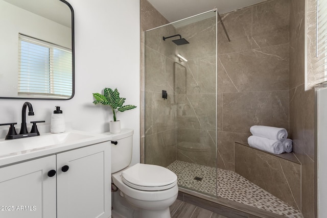 1909 N 74th St, Scottsdale, AZ 85257 - full bathroom featuring a walk in shower, vanity, and wood finished floors