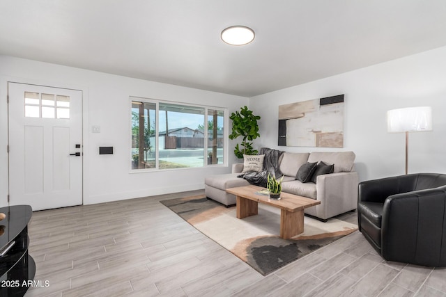 1909 N 74th St, Scottsdale, AZ 85257 - living room featuring light wood-style floors and baseboards