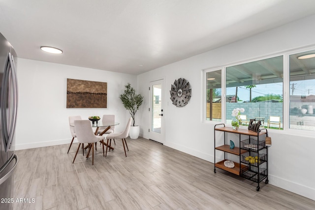 1909 N 74th St, Scottsdale, AZ 85257 - dining area with plenty of natural light and light wood finished floors