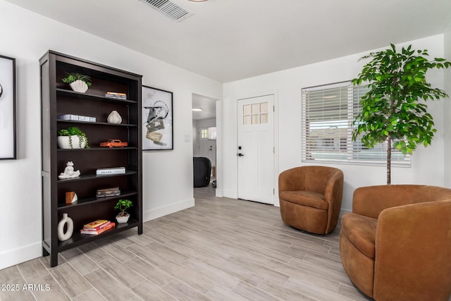 1909 N 74th St, Scottsdale, AZ 85257 - living area with light wood-style floors and baseboards