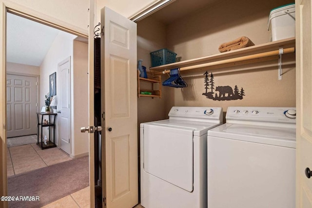 2086 Pinewood Dr, Overgaard, AZ 85933 - laundry room featuring light tile patterned floors, separate washer and dryer, and light carpet