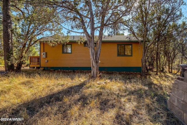 2086 Pinewood Dr, Overgaard, AZ 85933 - view of side of home with crawl space