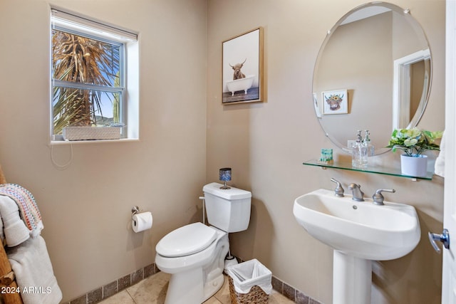 bathroom featuring tile patterned floors and toilet