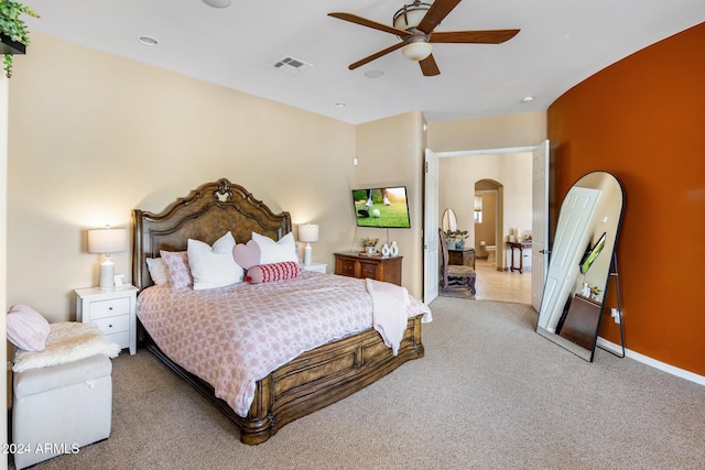 bedroom with light colored carpet and ceiling fan