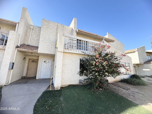 multi unit property featuring a balcony