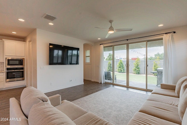 3023 W New River Dr, San Tan Valley, AZ 85144 - living area featuring recessed lighting, dark wood-style flooring, baseboards, ceiling fan, and visible vents