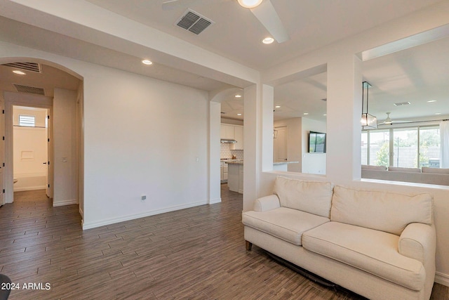 3023 W New River Dr, San Tan Valley, AZ 85144 - living area with wood finished floors, recessed lighting, arched walkways, and visible vents