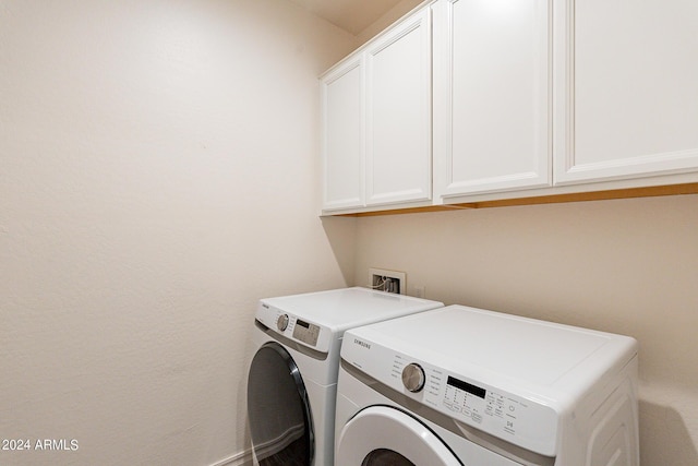 3023 W New River Dr, San Tan Valley, AZ 85144 - laundry room featuring cabinet space and separate washer and dryer