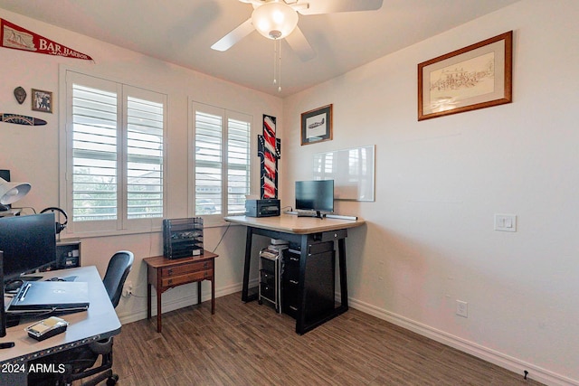 3023 W New River Dr, San Tan Valley, AZ 85144 - home office with dark wood-style floors, ceiling fan, and baseboards