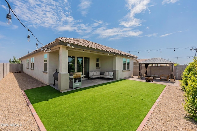 3023 W New River Dr, San Tan Valley, AZ 85144 - rear view of property with a patio, a fenced backyard, a gazebo, an outdoor living space with a fire pit, and a yard