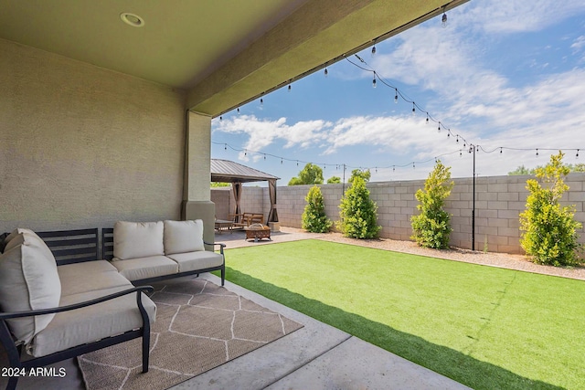 3023 W New River Dr, San Tan Valley, AZ 85144 - view of patio / terrace featuring a fenced backyard and an outdoor living space with a fire pit