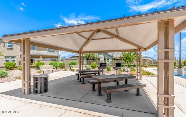3023 W New River Dr, San Tan Valley, AZ 85144 - view of property's community with a gazebo, fence, and a patio area