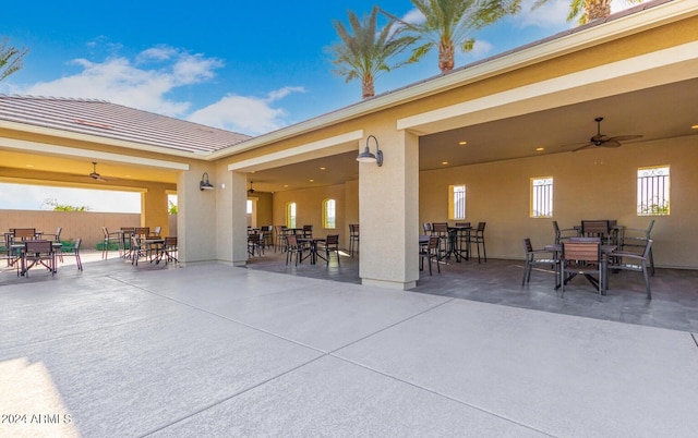 3023 W New River Dr, San Tan Valley, AZ 85144 - view of patio featuring a ceiling fan and outdoor dining space