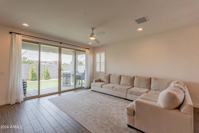 3023 W New River Dr, San Tan Valley, AZ 85144 - living area featuring visible vents, baseboards, wood finished floors, recessed lighting, and a ceiling fan