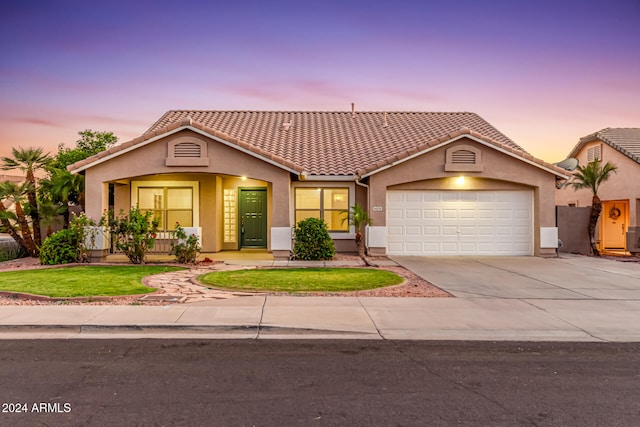 view of front of house with a garage