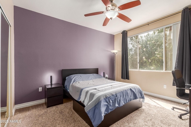 5345 E Van Buren St Unit 258, Phoenix, AZ 85008 - carpeted bedroom featuring a ceiling fan and baseboards
