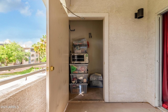5345 E Van Buren St Unit 258, Phoenix, AZ 85008 - entrance to property featuring a balcony and stucco siding
