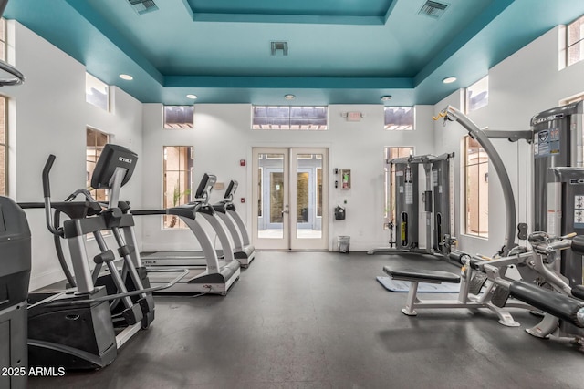 5345 E Van Buren St Unit 258, Phoenix, AZ 85008 - gym with a tray ceiling, visible vents, and french doors