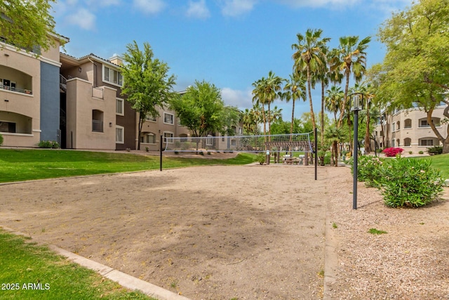 5345 E Van Buren St Unit 258, Phoenix, AZ 85008 - view of property's community featuring a yard and volleyball court