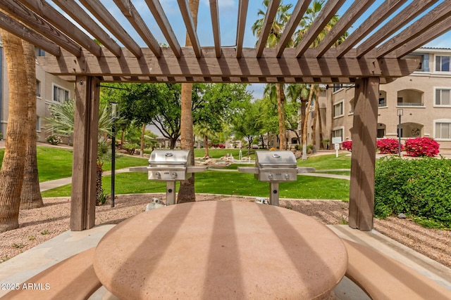 5345 E Van Buren St Unit 258, Phoenix, AZ 85008 - view of patio / terrace featuring a pergola and a grill