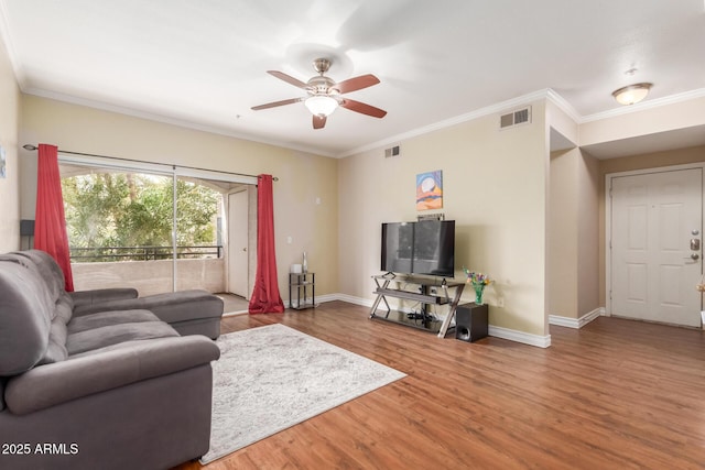 5345 E Van Buren St Unit 258, Phoenix, AZ 85008 - living room with baseboards, ceiling fan, visible vents, and wood finished floors