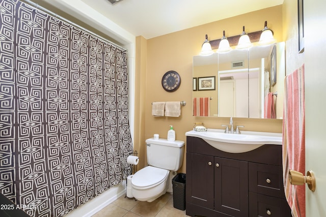 bathroom with tile patterned flooring, vanity, a shower with curtain, and toilet