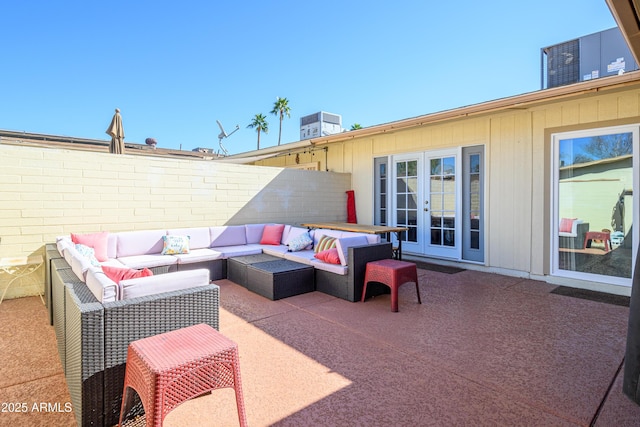 view of patio with french doors and an outdoor hangout area