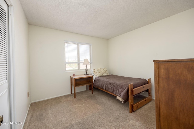 1454 W Capri Ave, Mesa, AZ 85202 - bedroom featuring carpet and a textured ceiling